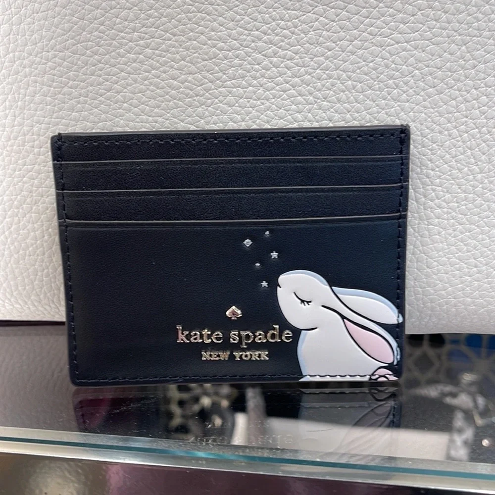Kate Spade Bunbun Bunny Small Slim Card Holder Wallet

COLOR:
Black Multi
NWT - Picture 14 of 16